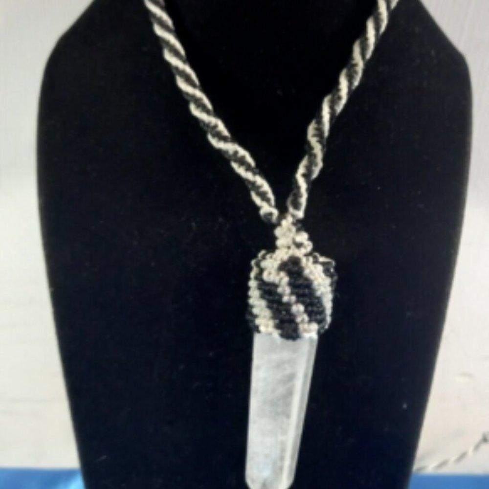 Peruvian necklace woven in macrame thread and crystal quartz energy stone